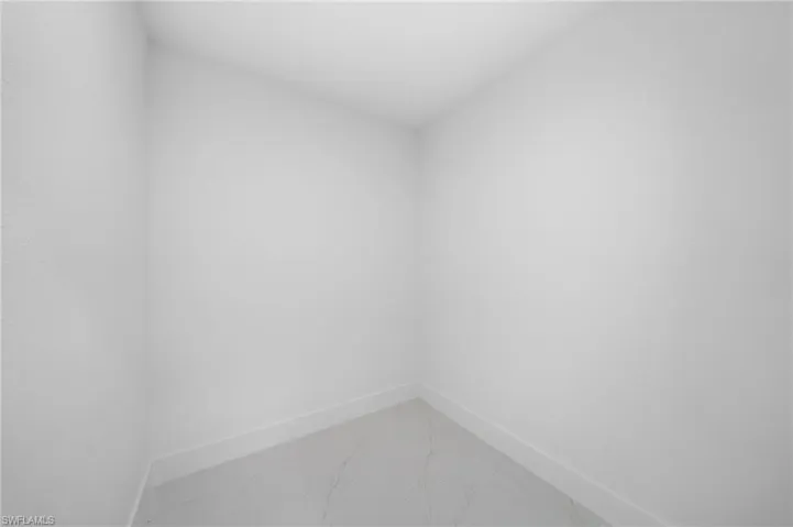 Spare room with tile patterned floors