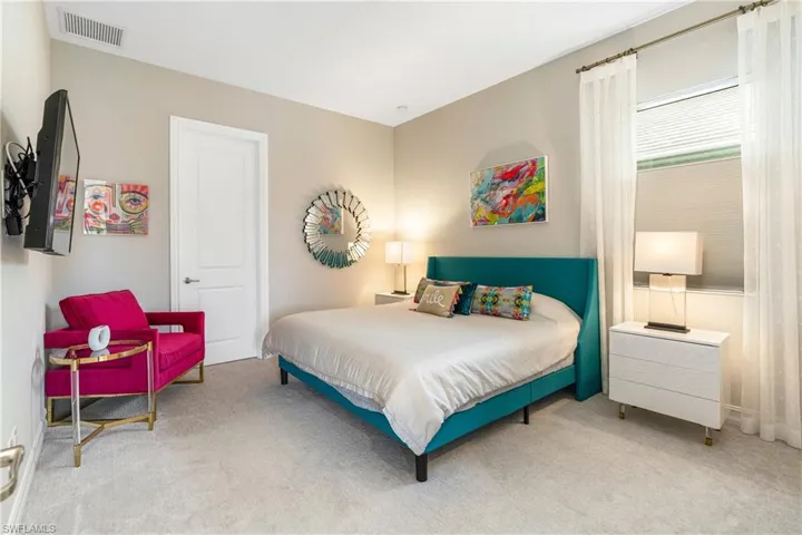 Bedroom with carpet flooring