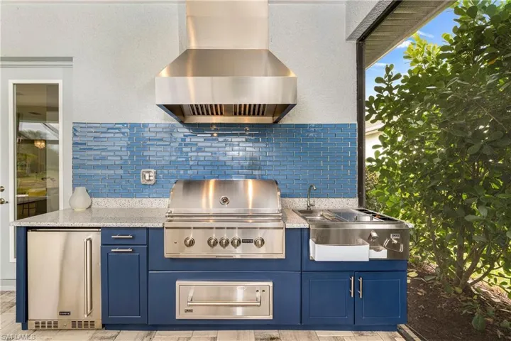 View of patio featuring grilling area and an outdoor kitchen