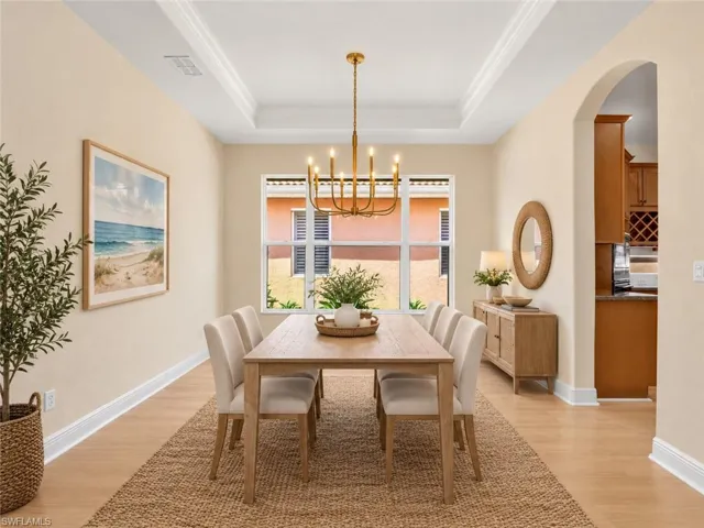 Dinning Room After Photo includes reality staging to showcase the possibility of the dining room's potential. Design services are included with the purchase!