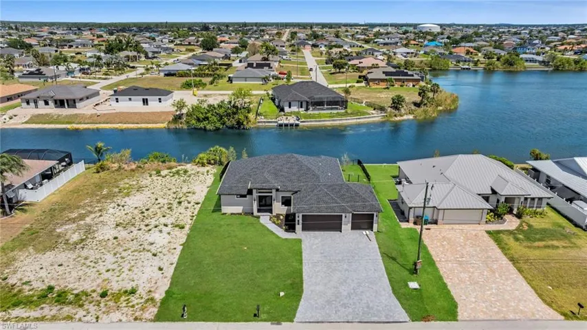 Bird's eye view with a residential view and a water view