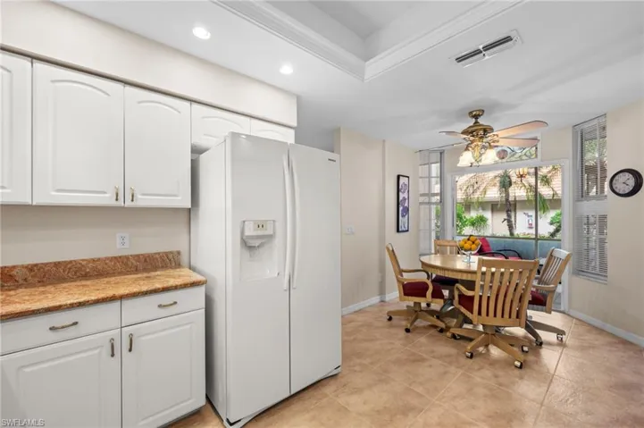 Dining room featuring ceiling fan, ornamental molding, and recessed lighting