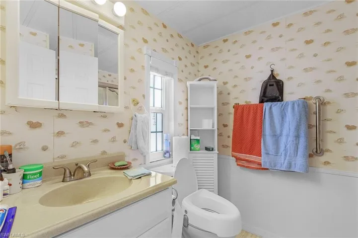 Bathroom with vanity and toilet