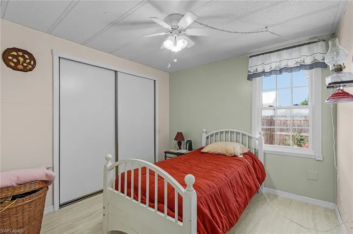 Bedroom with a closet and ceiling fan