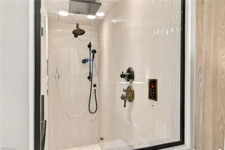 Luxury experience with multiple shower heads and steam