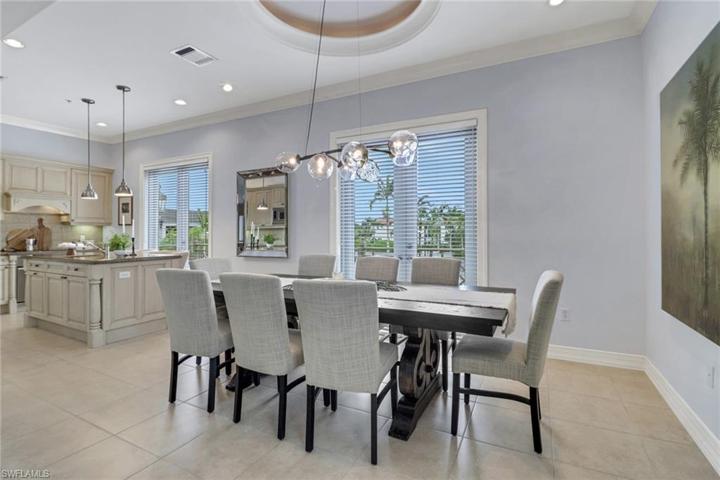 Convenient wet bar off the living room plus under stair storage