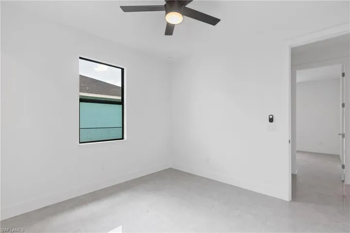 Spare room featuring ceiling fan