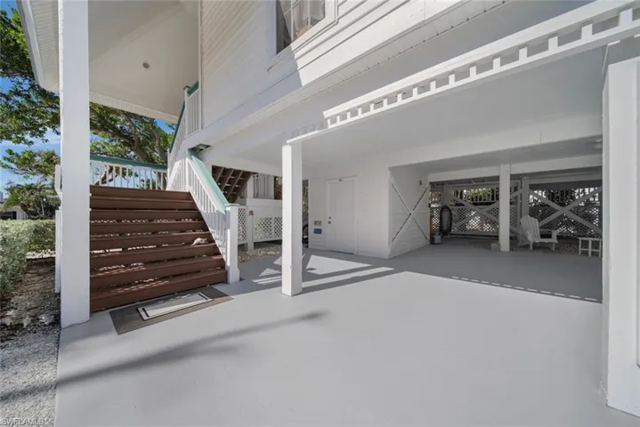 View of patio with a carport