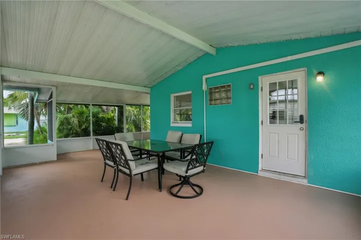 Sunroom with outdoor dining space