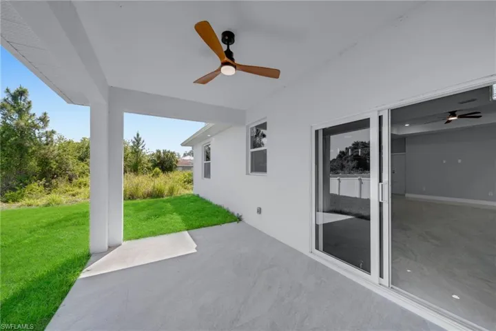 View of patio with a ceiling fan