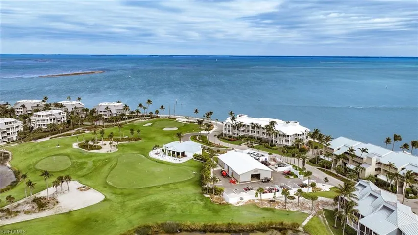 Bird's eye view of a large body of water and a golf course