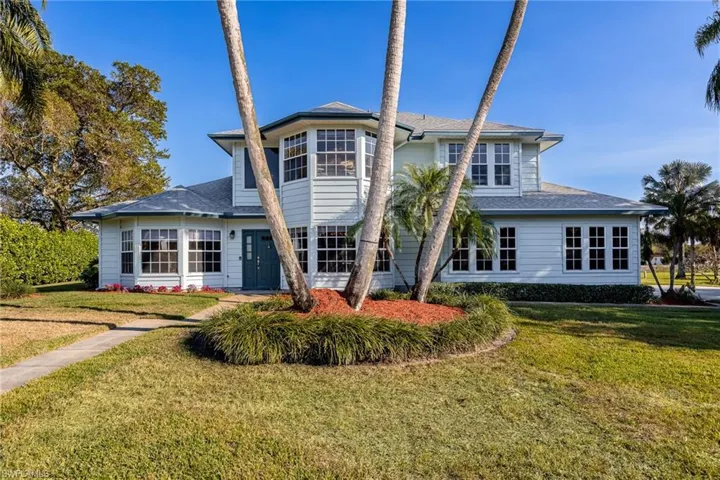 View of front of property featuring a front yard and new shingle roof