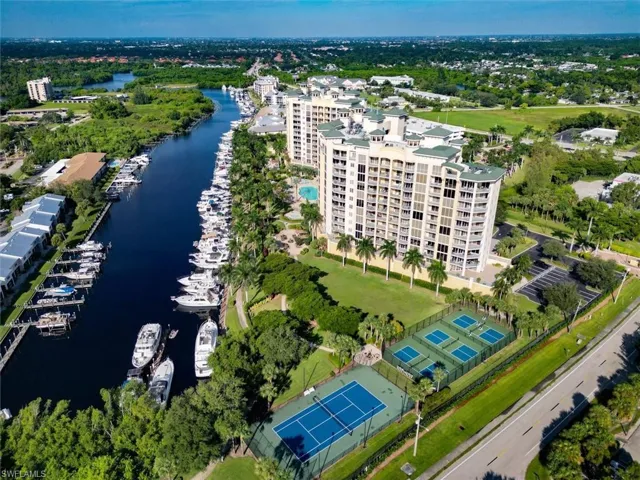 Aerial view of a large body of water and apartment complex