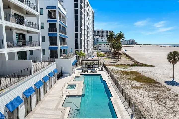 Community pool with a patio area