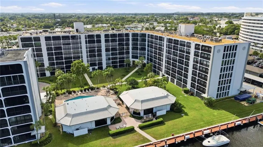 Aerial view of the building plus the clubhouses with the river frontage