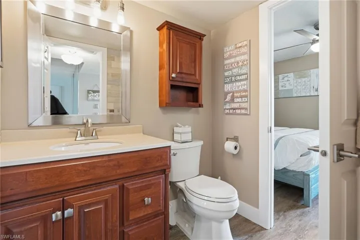 Bathroom with a glass enclosed shower.