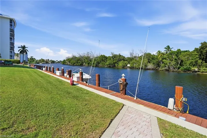 Dock area featuring water and electrical outlets
