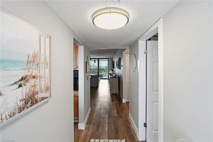 Entryway with artwork and an entry