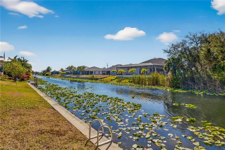 Water view featuring nearby suburban area