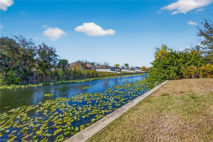 Water view featuring nearby suburban area