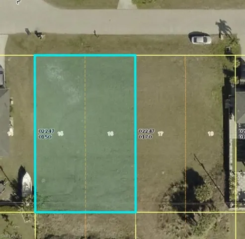 Aerial overview of property's location featuring property parcel outlined