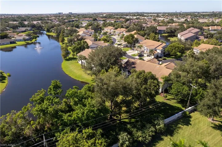 Aerial perspective of lake  behind condo