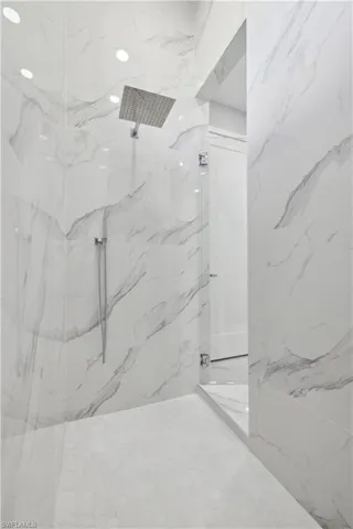 Bathroom with a tile shower