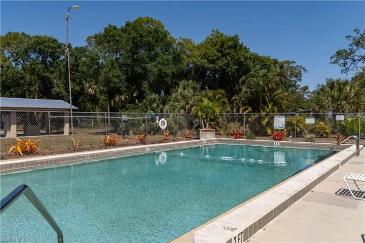 Community pool with fence
