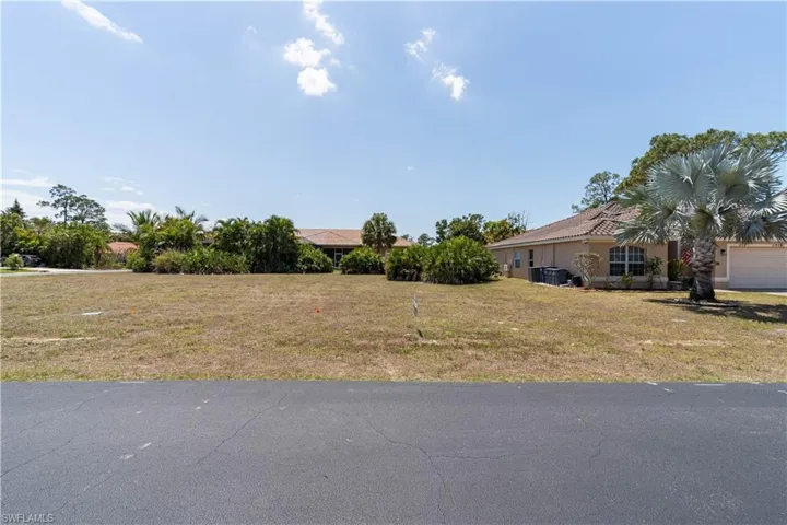 View of yard with a garage