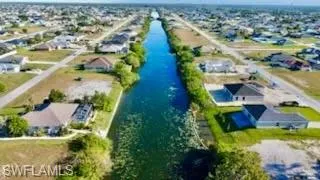 Aerial view of residential area with a large body of water