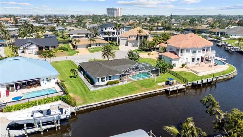 Aerial view with a residential view and a water view