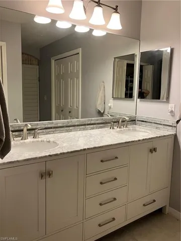 Bathroom featuring vanity and tile patterned floors