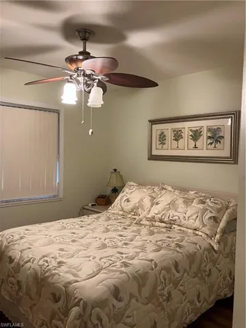 Bedroom featuring a closet and ceiling fan