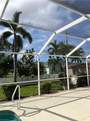View of pool and back yard