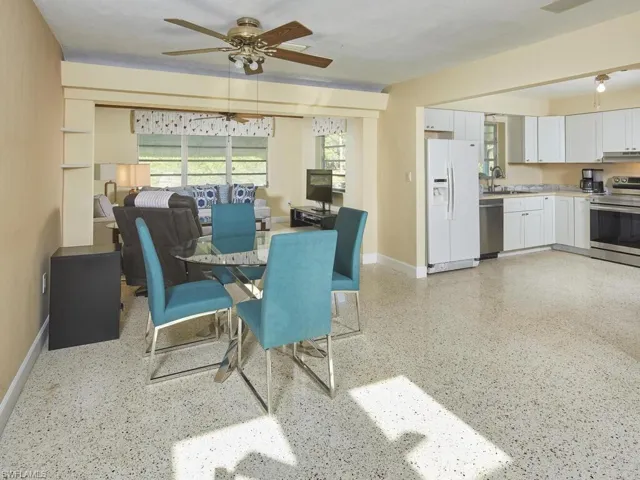 Living room, dining and kitchen are all open to one another.