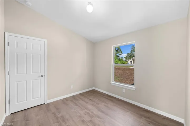 Unfurnished room featuring light hardwood / wood-style floors
