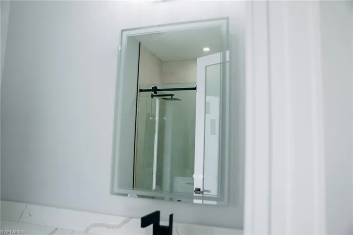 Bathroom view of a stall shower