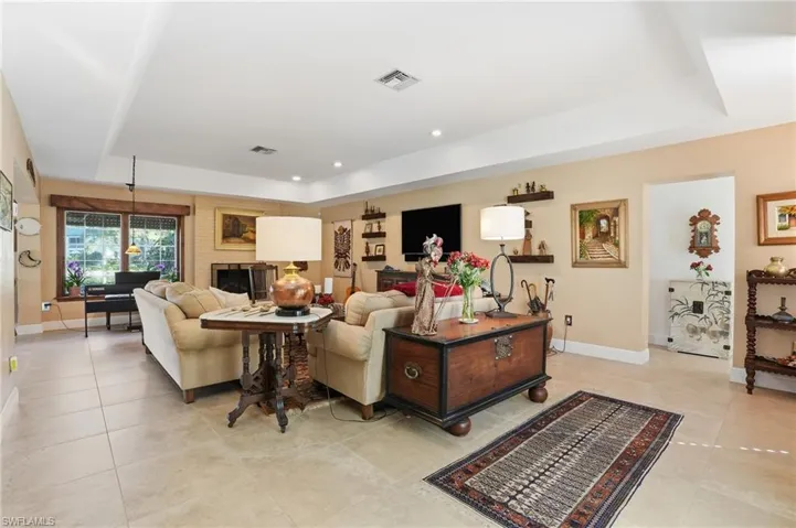 Enjoy this Living room complete with lake views and a real fireplace