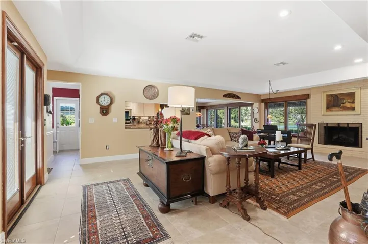 The foyer area opens to a spacious open living room