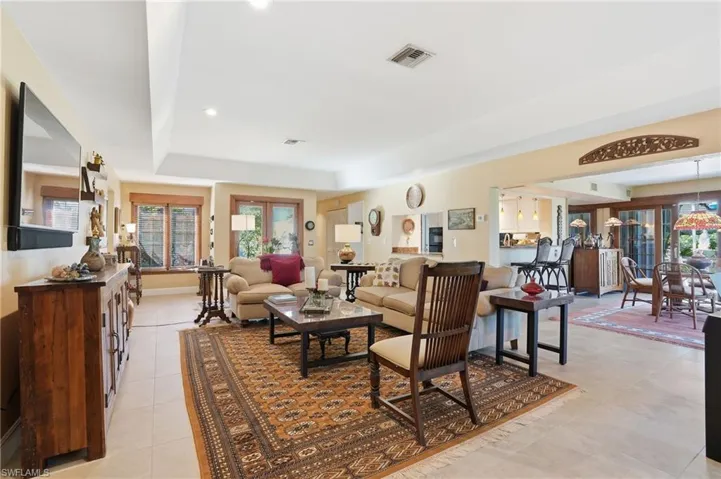 Living room and Dining room al enjoy lake views and tons of natural light