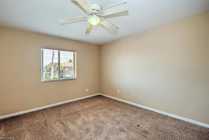 Bedroom 2 with lighted ceiling fan!