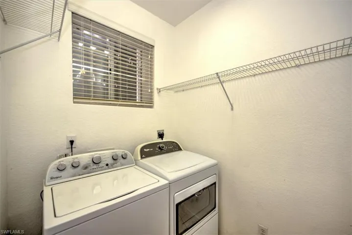 First floor utility laundry room with storage!