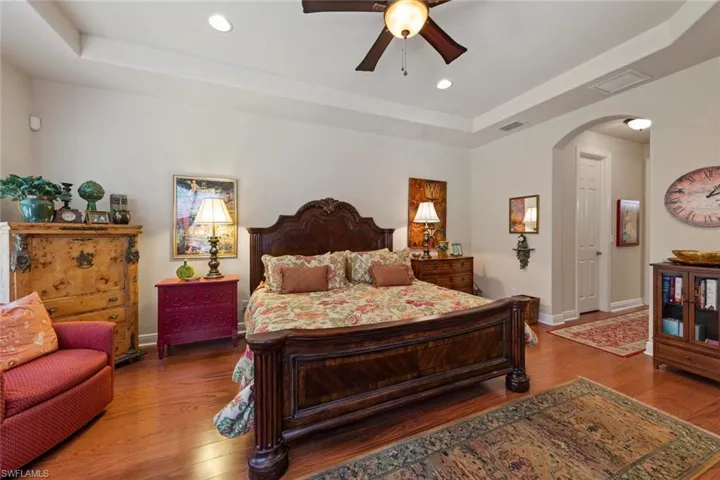 Master hall on right leads to walk-in closets, master ensuite bath