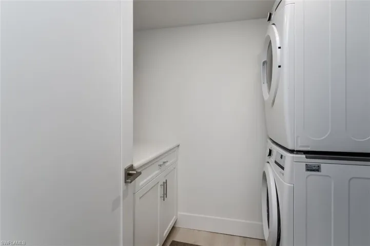 Laundry Room with full size washer and dryer.