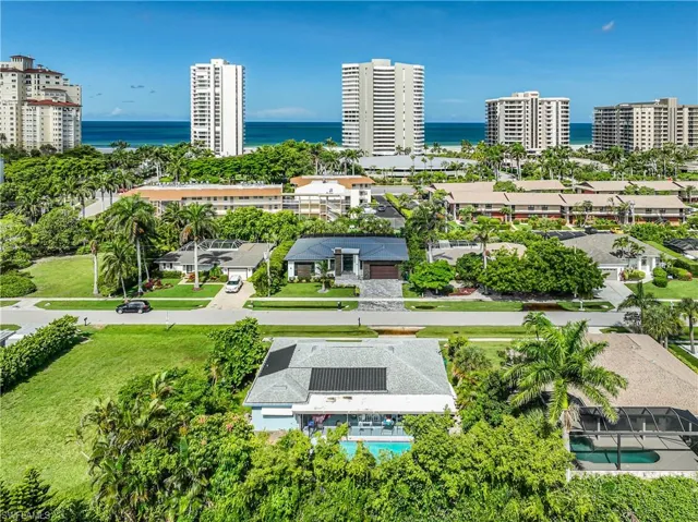 Bird's eye view of a large body of water and a pool