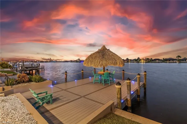 Dock with a water view and boat lift