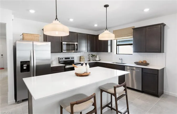 Photos are from a furnished model. Options for this home may vary.