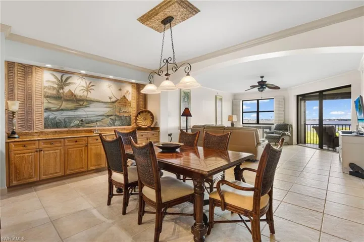 This open concept design has a dining area includes a wet bar area and serving space! Perfect for serving large groups or intimate gatherings!