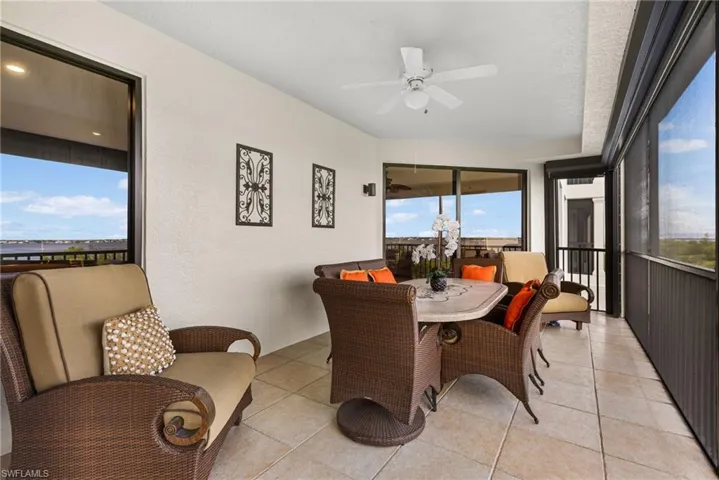 Fabulous lanai space has room for a dining area and seating area!