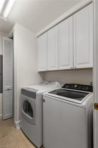 Laundry has extra storage.